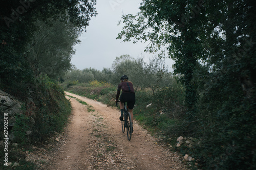 Evening gravel ride throught olive orchards