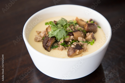 Steamed egg decorated with vegetable, mushroom