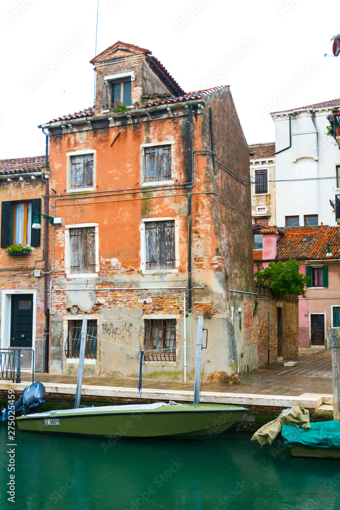 Wonderful corner of Venice with a canal and old houses