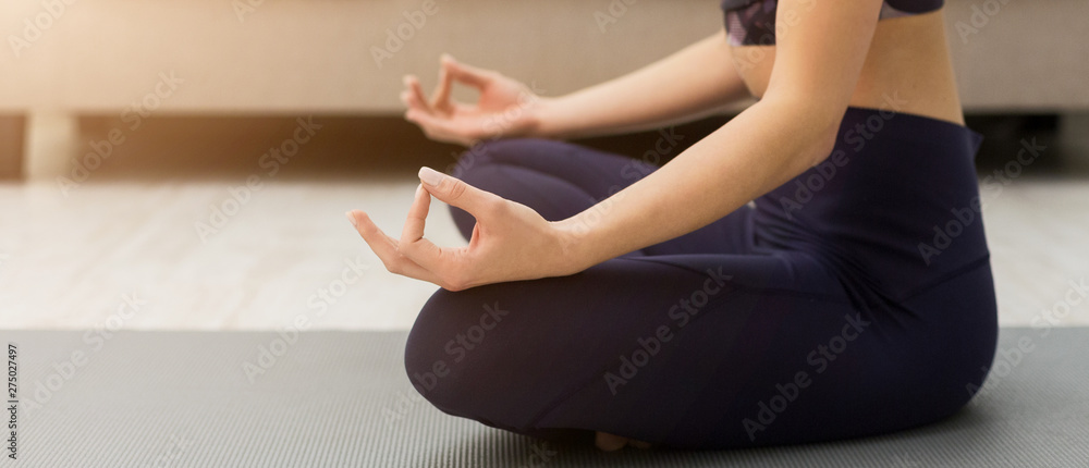 Keep Calm. Woman Meditating In Lotus Position At Home