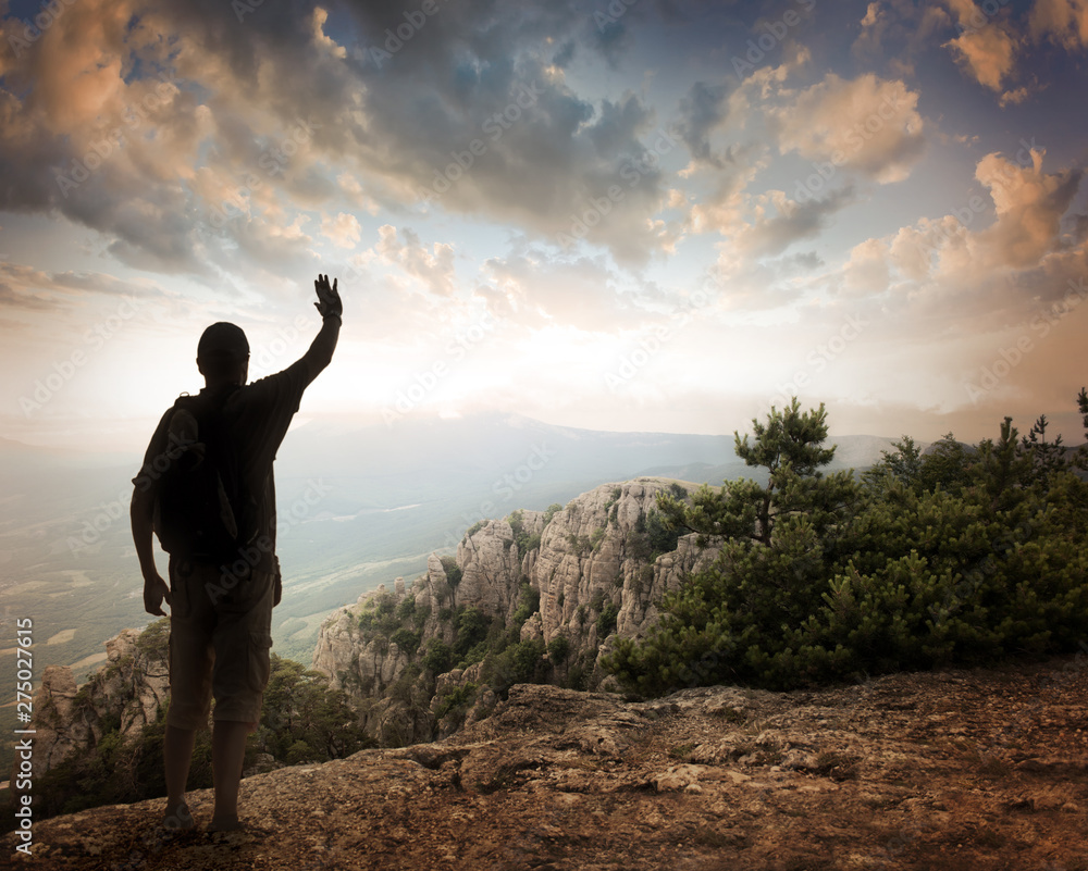 Silhouette of tourist and a beautiful landscape Silhouette of tourist and a beautiful landscape