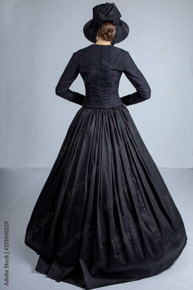 Victorian woman in black outfit