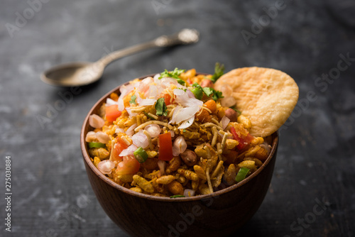 Bhelpuri Chaat/chat is a road side tasty food from India, served in a bowl or plate. selective focus photo