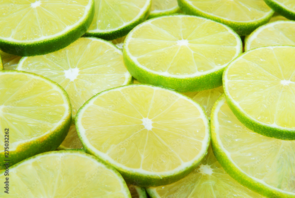 Fototapeta premium Lime slices as background
