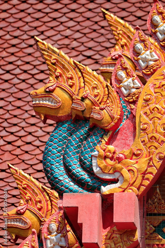 Fototapeta premium Buddha statues and patterns for decorating the stupa with roofs in Thai temples