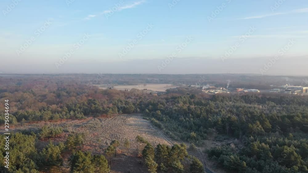 Aerial drone shot of snowy landscape track in Aerial drone shot of snowy landscape track in