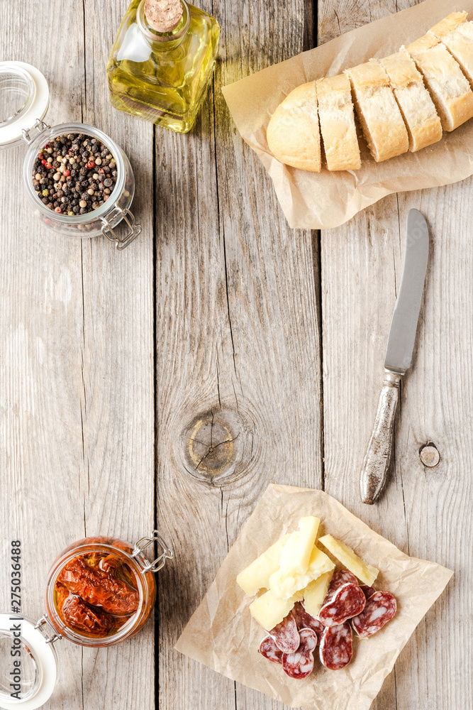 Italian appetizers on wooden table. Food background Italian appetizers on wooden table. Food background