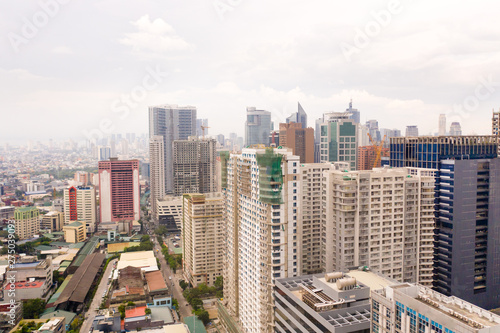 Modern city. The city of Manila  the capital of the Philippines. Modern metropolis in the morning  top view. Modern buildings in the city center.