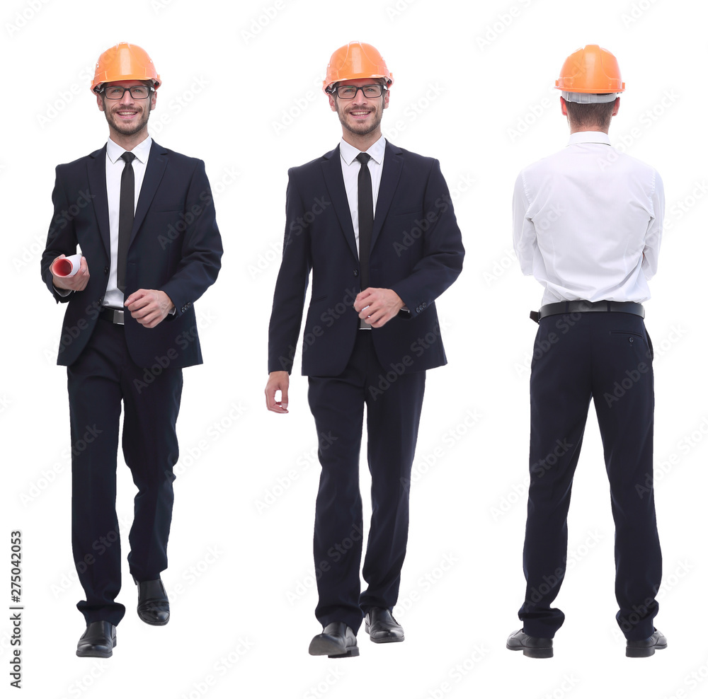 in full growth .successful architect engineer in orange helmet. in full growth .successful architect engineer in orange helmet.