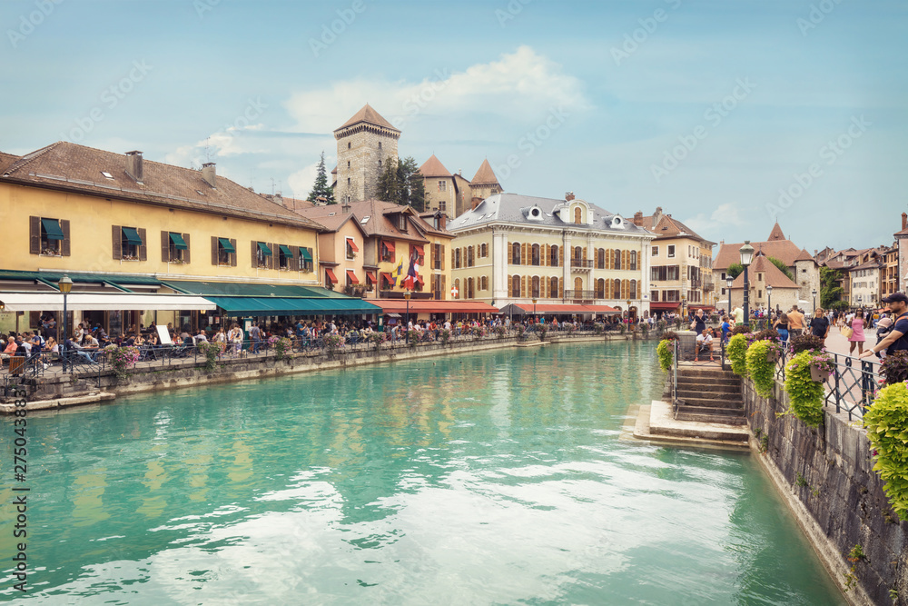 Panorama of Annecy canal of old town with tourists