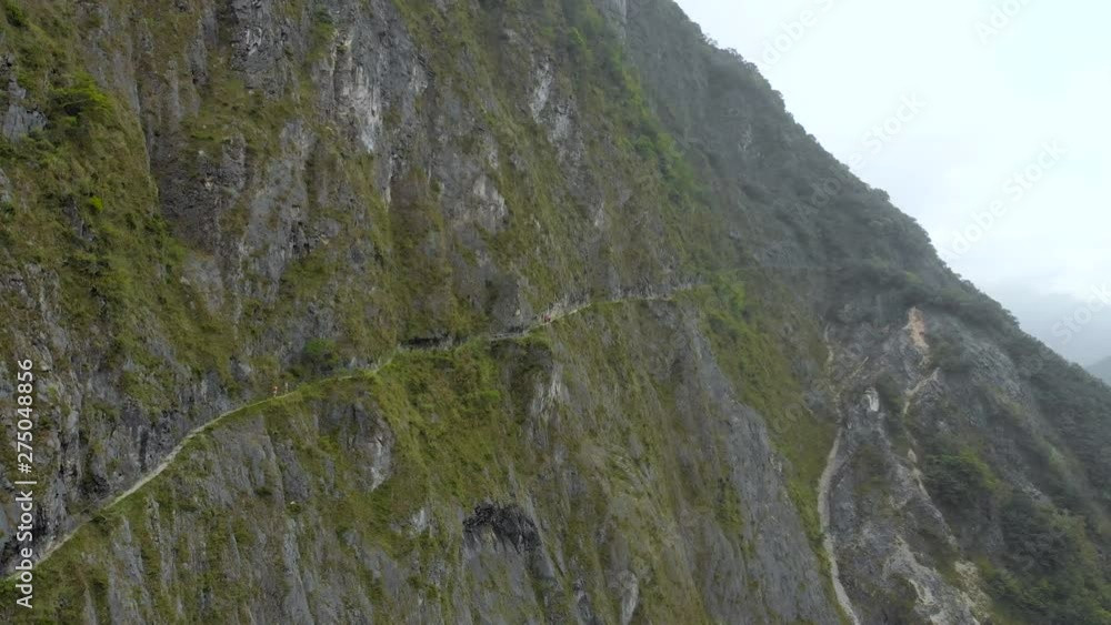 AERIAL - Flying Near Crazy Mountain Side Trail On Cliff Edge In Taroko Gorge Taiwan - Zhuilu Trail AERIAL - Flying Near Crazy Mountain Side Trail On Cliff Edge In Taroko Gorge Taiwan - Zhuilu Trail
