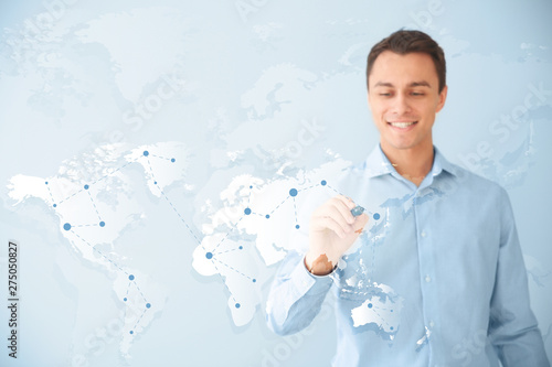 Male travel agent marking r...