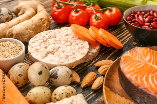 Different healthy food on wooden table