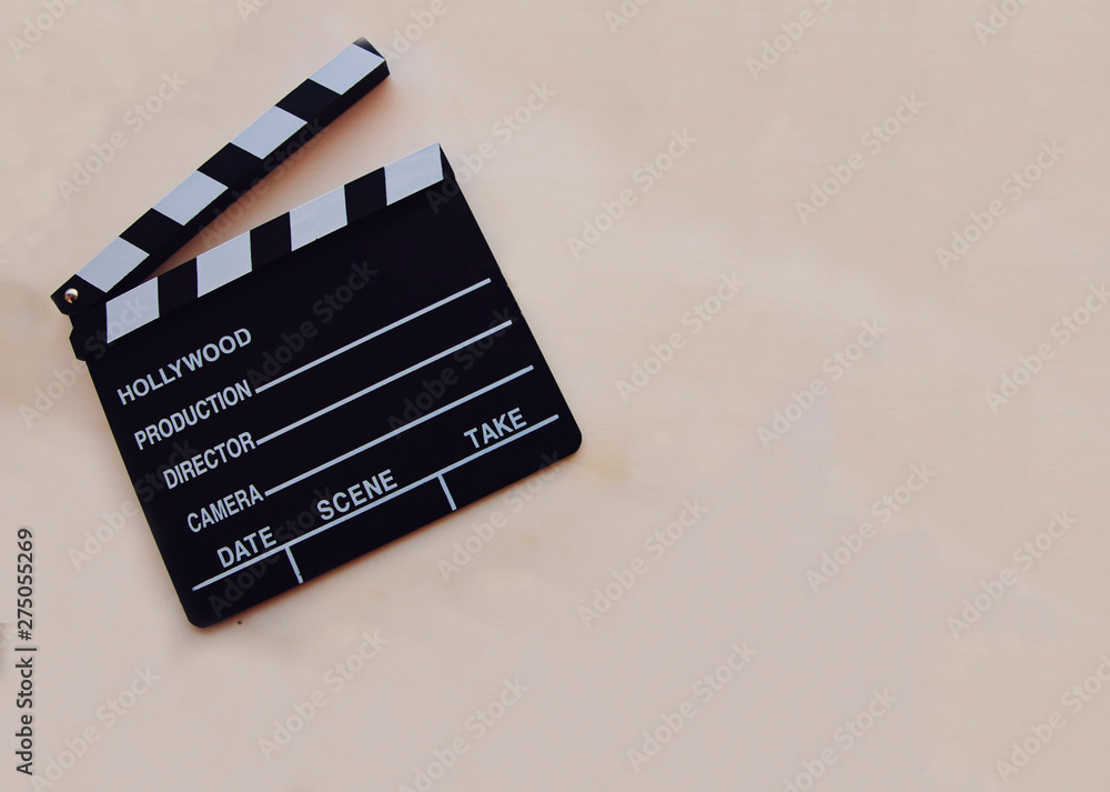 White background with a movie clapboard.