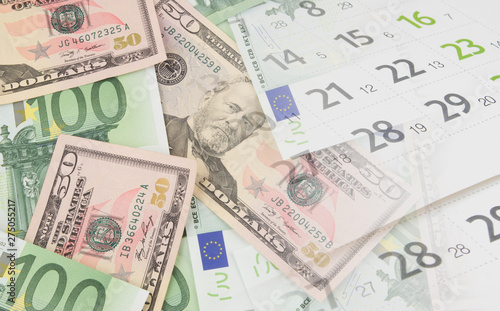 US dollars and euro banknotes and calendar page collage, investing concept