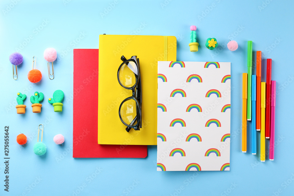 Back to school concept. Set of different school supplies, notebook, pen, accessories on paper textured background. Various scolorful stationery items. Close up, copy space, top view, flat lay. Back to school concept. Set of different school supplies, notebook, pen, accessories on paper textured background. Various scolorful stationery items. Close up, copy space, top view, flat lay.