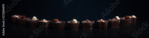 Chocolate candies on a dark background