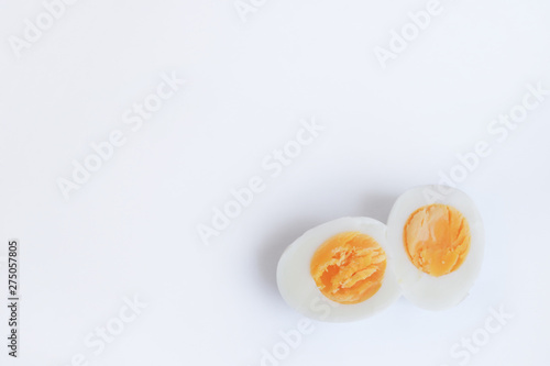 Background with cut egg and solar yolk