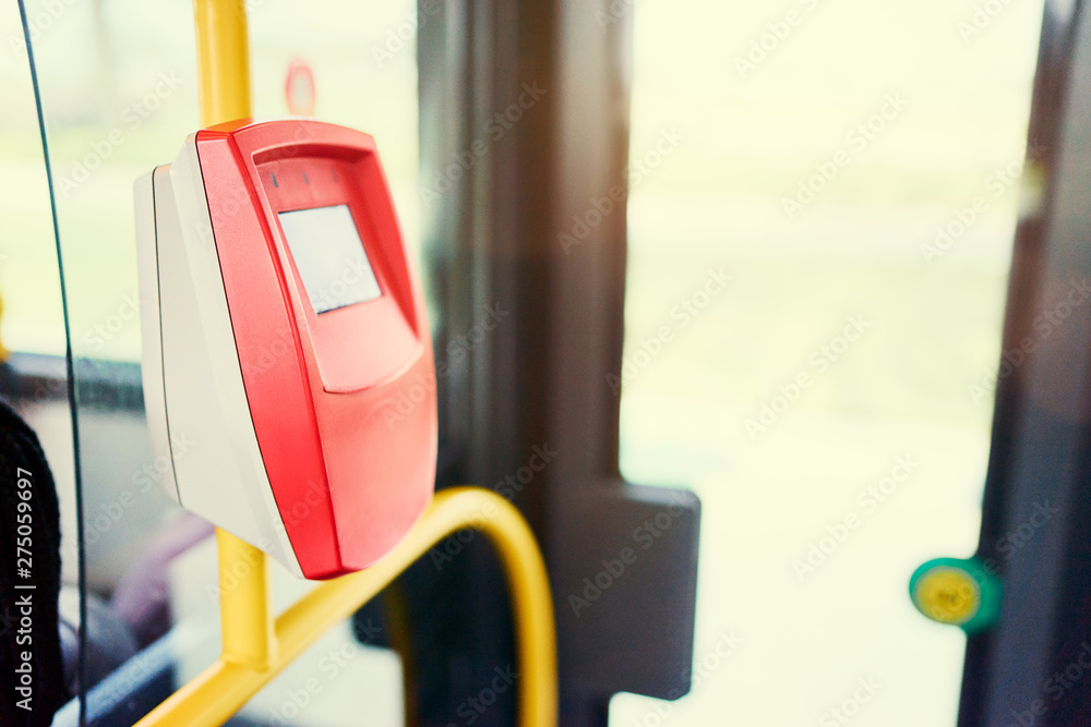 Red scaner reader for tickets in public transport.