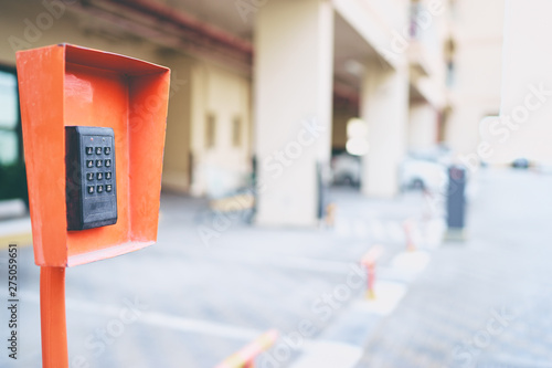 Security technology. Card reader scanner for digital key on car parking.