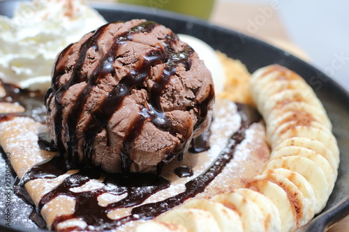 ice cream on the waffle and wipping cream photo