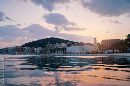 Travel by Croatia. Beautiful sunset landscape with Split Old Town on sea promenade.