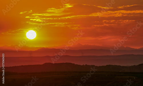 beautiful orange sunset with the mountains - Image
