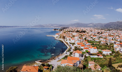 Fototapeta Naklejka Na Ścianę i Meble -  Aerial shot of the Kastel coast in Dalmatia,Croatia . A famous tourist destination on the Adriatic sea. Old town near the mountains.