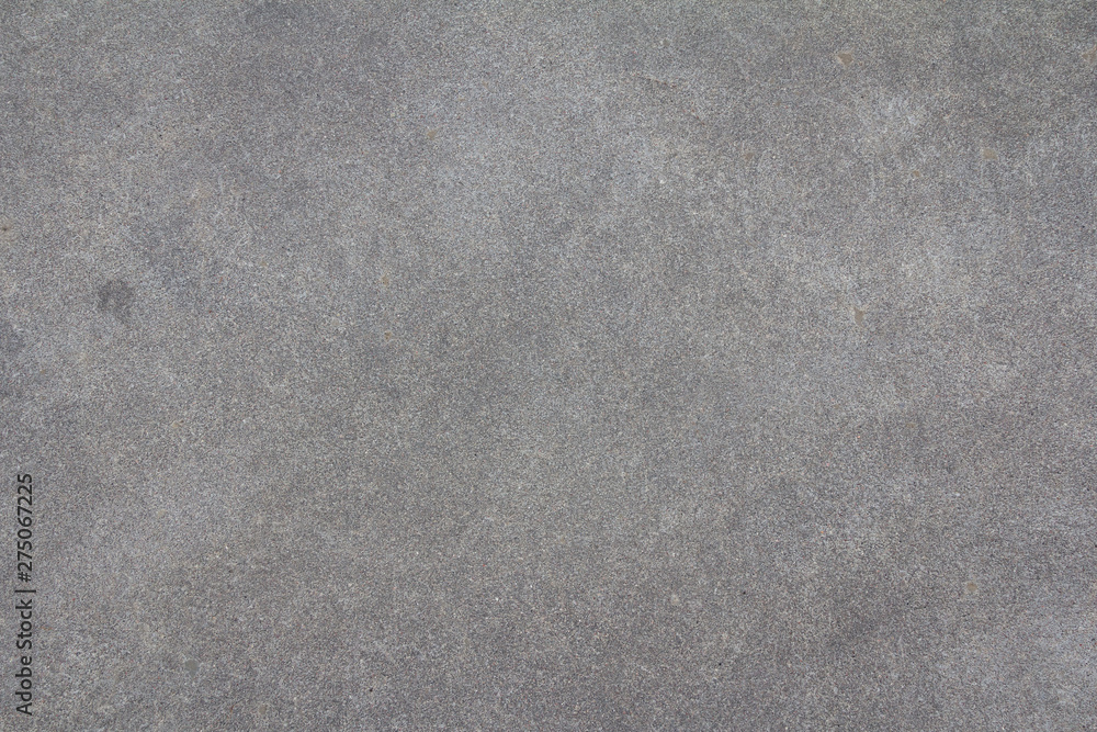 Sanded cement background. Smooth concrete surface. Polished grey stone texture. Sanded cement background. Smooth concrete surface. Polished grey stone texture.