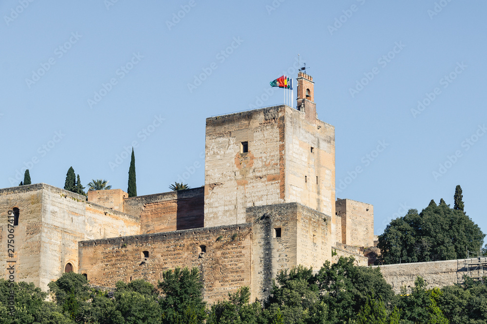 View of the Alhambra Palace from the Carvajales viewpoint. Blue sky for copy space or collage