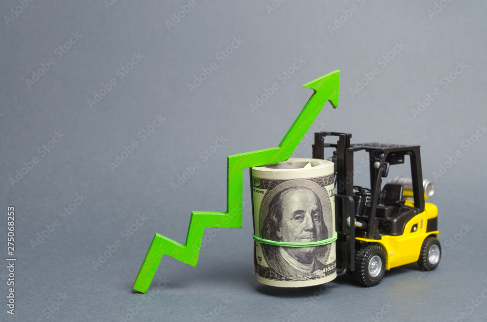 Yellow Forklift truck carries a big bundle of dollars and green up