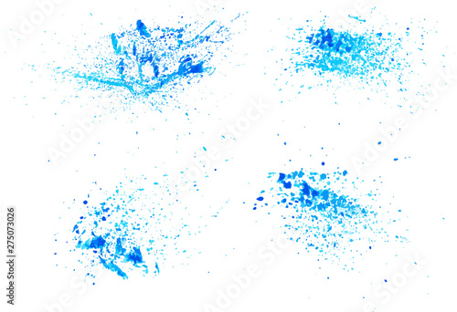 Set of bright blue abstract watercolor stains with splashes and splatters. Watercolor realistic element of design for abstract background. Isolated on white background.Trendy liquid colors