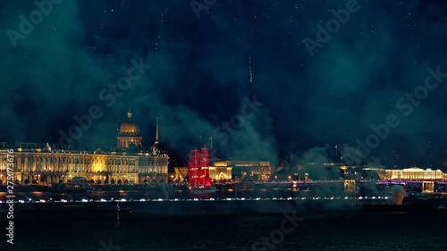 Fireworks over the water Holiday light. Night cityscape scene. Neva river, Saint-Petersburg, Russia. Holiday Scarlet Sails.