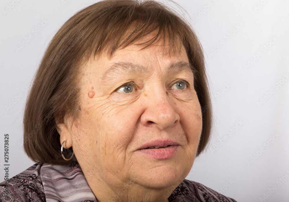 Portrait of an elderly interested woman Portrait of an elderly interested woman