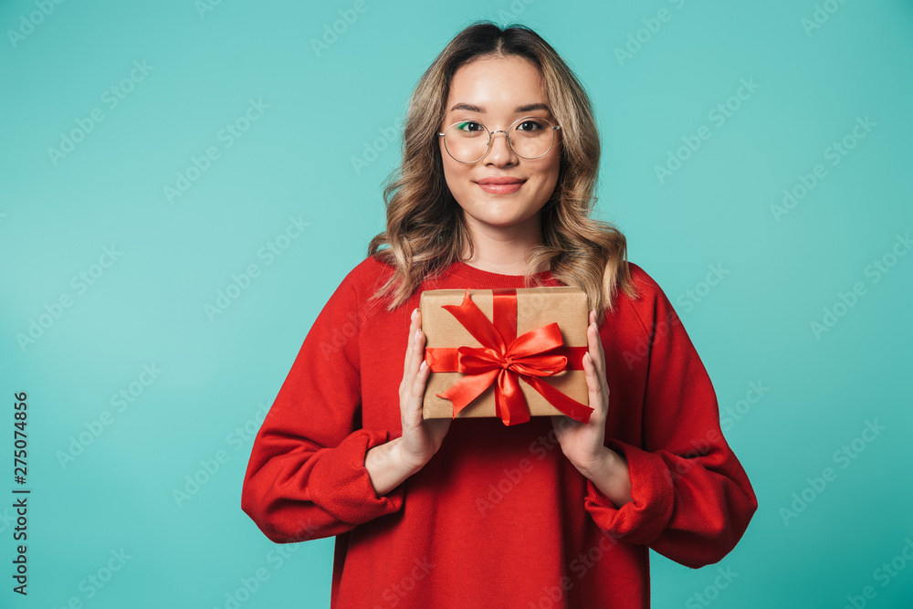 Portrait of a lovely young asian woman standing isolated Portrait of a lovely young asian woman standing isolated