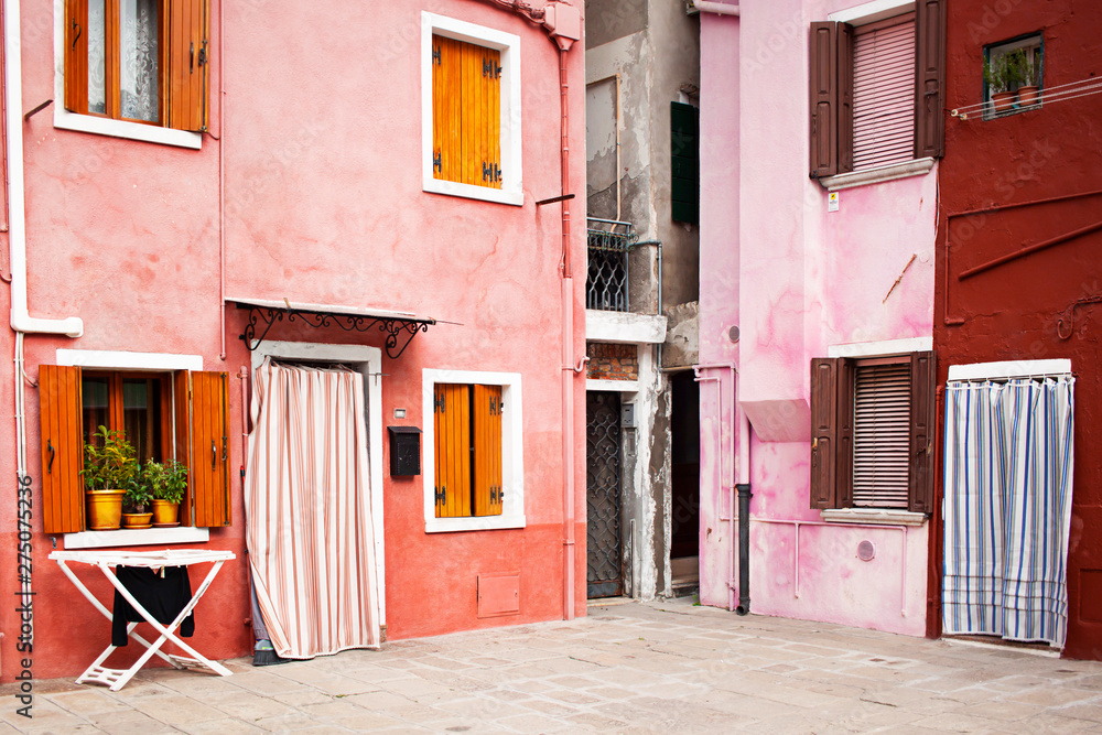 Colorful building in Burano island in Venice. Italian street