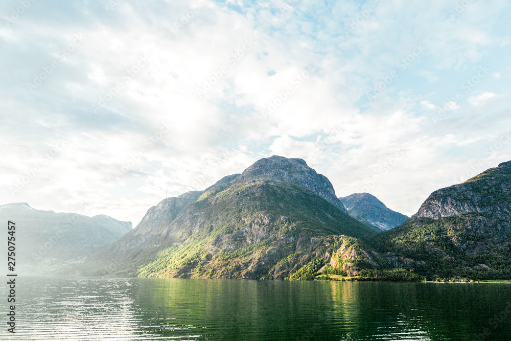 Scenics view of idyllic lake with mountain