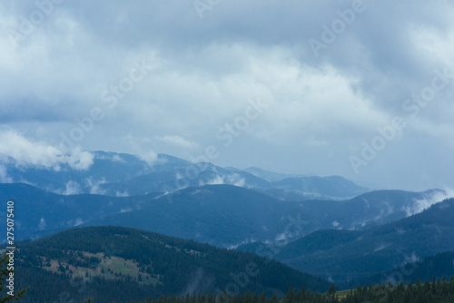 Mountain landscape against the sky with clouds