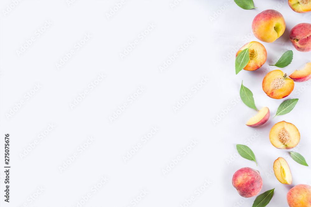 Fresh organic peaches, simple pattern, layout on white background Fresh organic peaches, simple pattern, layout on white background