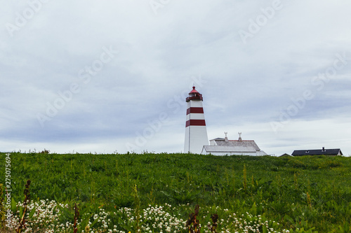 Alnes lighthouse at godoy island near alesund  norway © Freepik