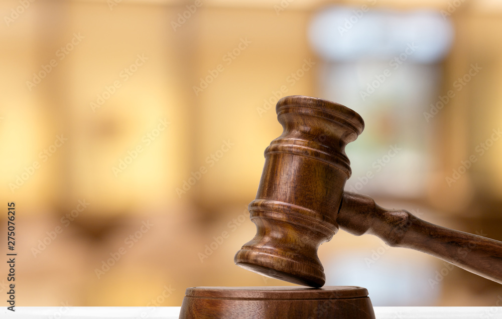 Law and justice concept image. Brown wooden background Law and justice concept image. Brown wooden background