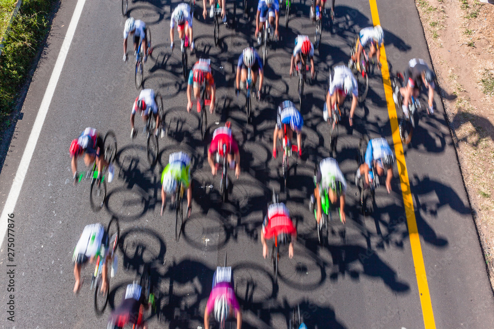 Obraz premium Cyclist Road Race Motion Speed Blur Overhead
