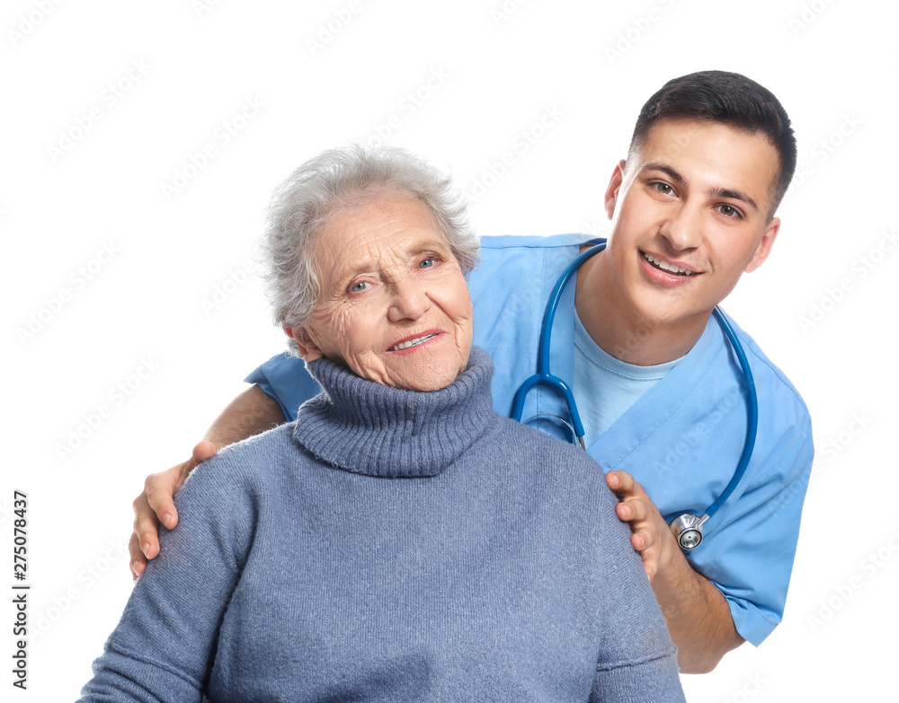 Young caregiver with senior woman on white background Young caregiver with senior woman on white background