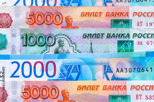 Russian money, a thousand rubles, two thousand rubles, five thousand rubles, the background image, Bills lie horizontally