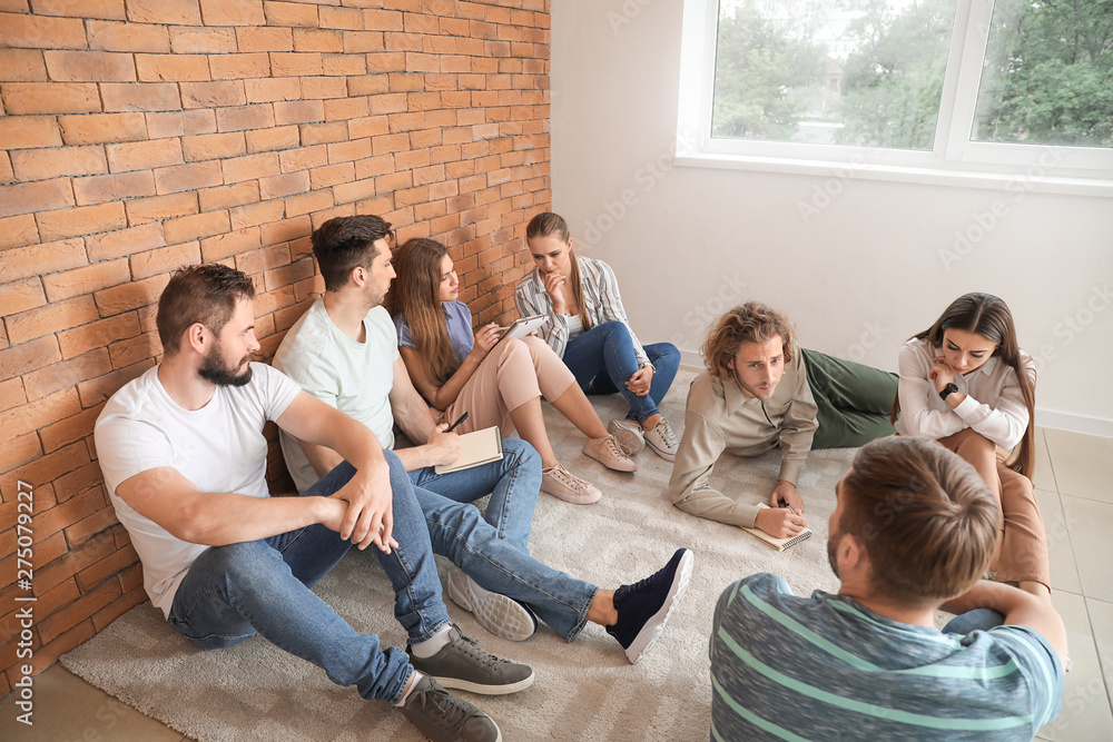 Young people at group therapy session Young people at group therapy session
