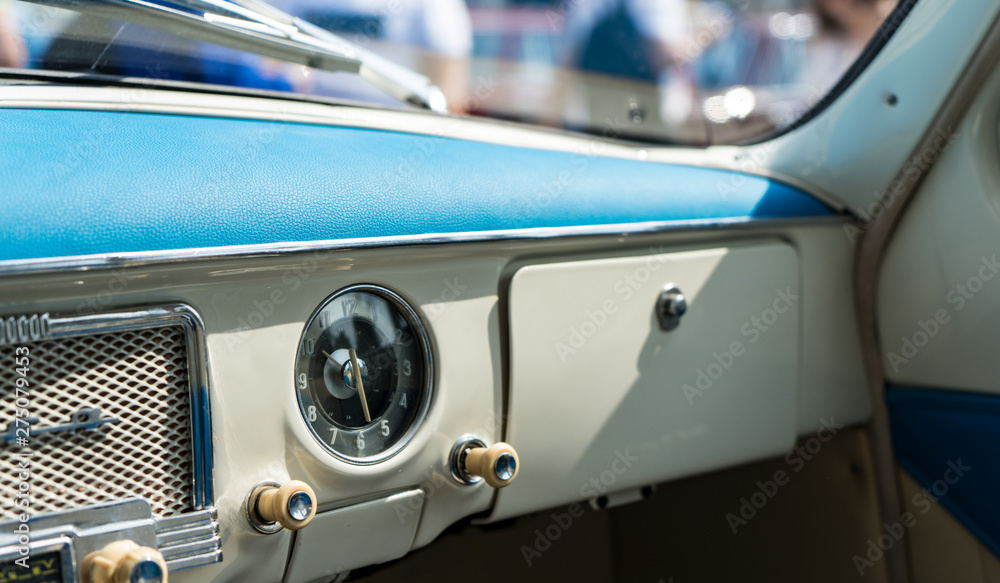 Fototapeta premium Old clock and radio in retro car. Old school.