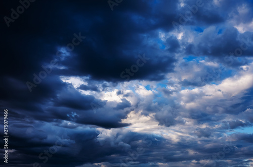 The sky in the clouds after the summer thunderstorm. The amazing dramatic texture of the clouds, the background image. 