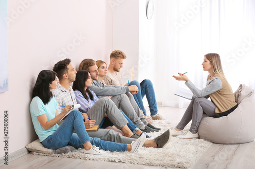 People at group therapy ses...