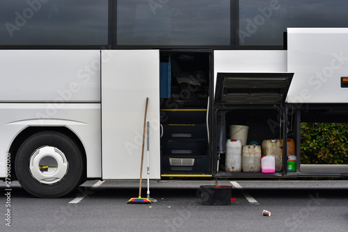 cleaning of white coach bus inside and outside