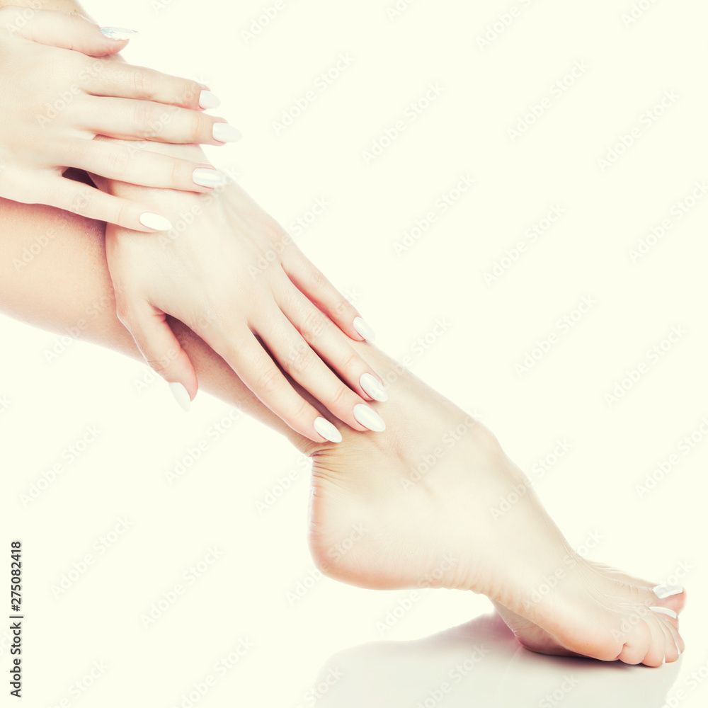 Naklejka premium care for sensuality woman hands and legs. Body care, healthy skin, manicure pedicure. Copy space